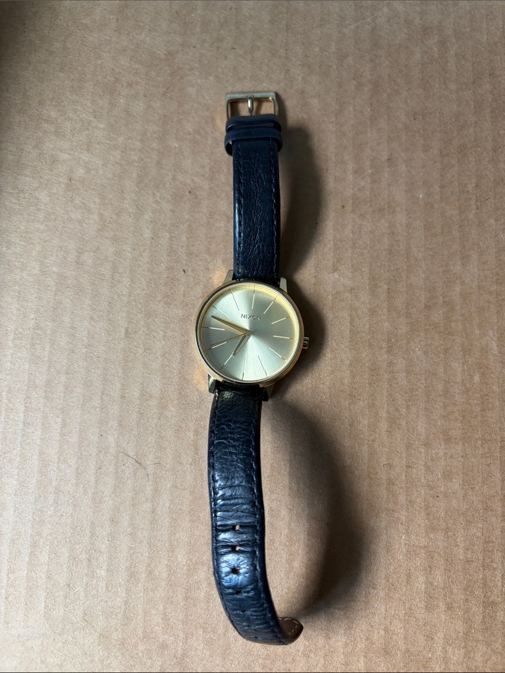 Nixon Gold Dial Black Leather Strap Watch